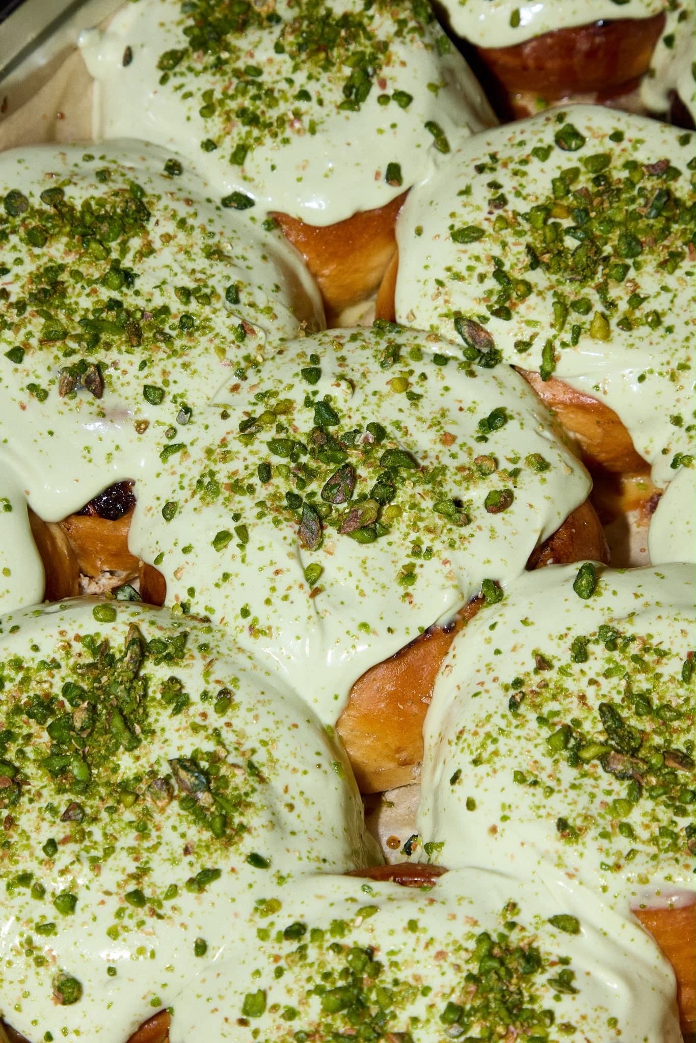 Pistachio-topped buns close-up at Rise & Bun Soho bakery